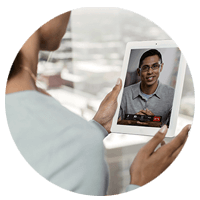 Female Professional In Video Conference Using a Tablet, Discussing Confidential Information with Her Boss 