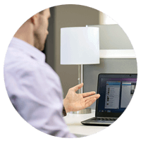 Male Professional Infront of Laptop, Analyzing the Clients Requirements in Setting up Webex